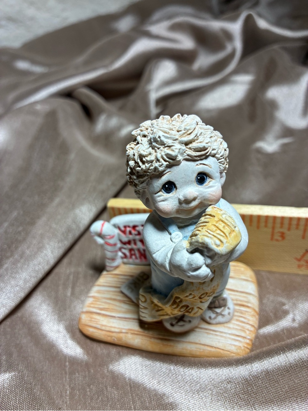 Dreamsicles Xmas Hand-Painted Cream and Blue Holiday Figurine - Child with Toy